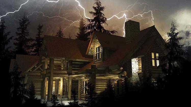 A rustic home in a lightning storm.